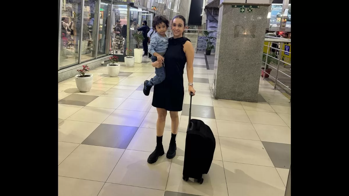 Mrs. Universe India 2023, Madhuri Patle, Radiates Elegance at Nagpur Airport with Toddler